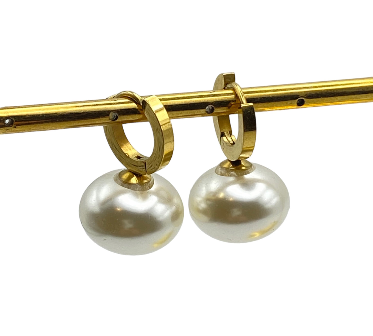 "PHOENIX" gold plated hoop earrings with a single statement pearl