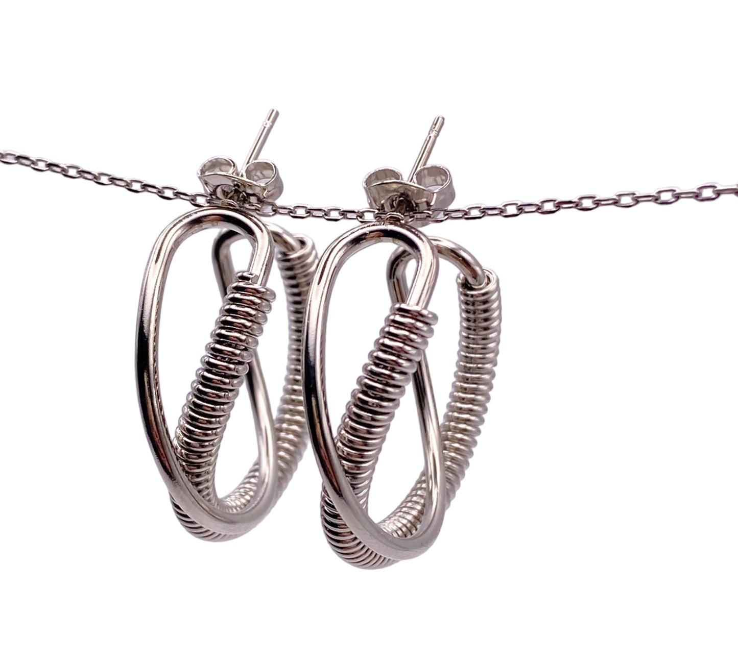 "VELVET" silver colored double open hoops