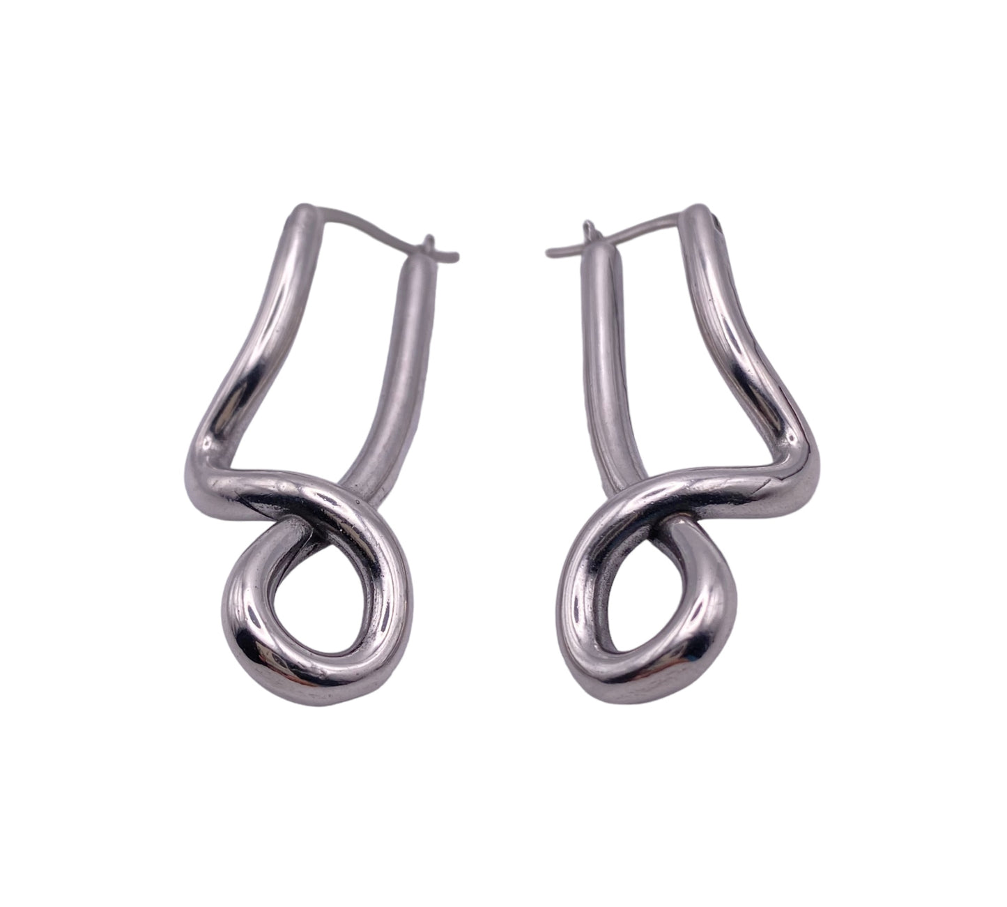 "ORNATE" silver colored twisted statement hoop earrings
