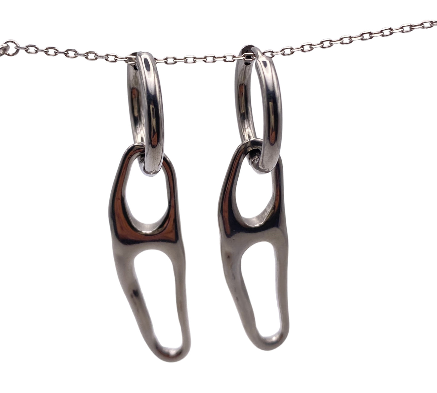 "EMBER" silver colored hoop earrings with a contemporary pendant