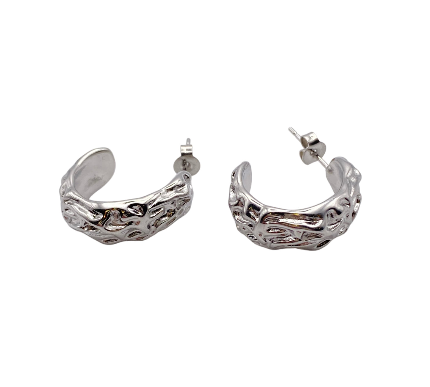 "AINE" silver colored open hoops with irregular surface