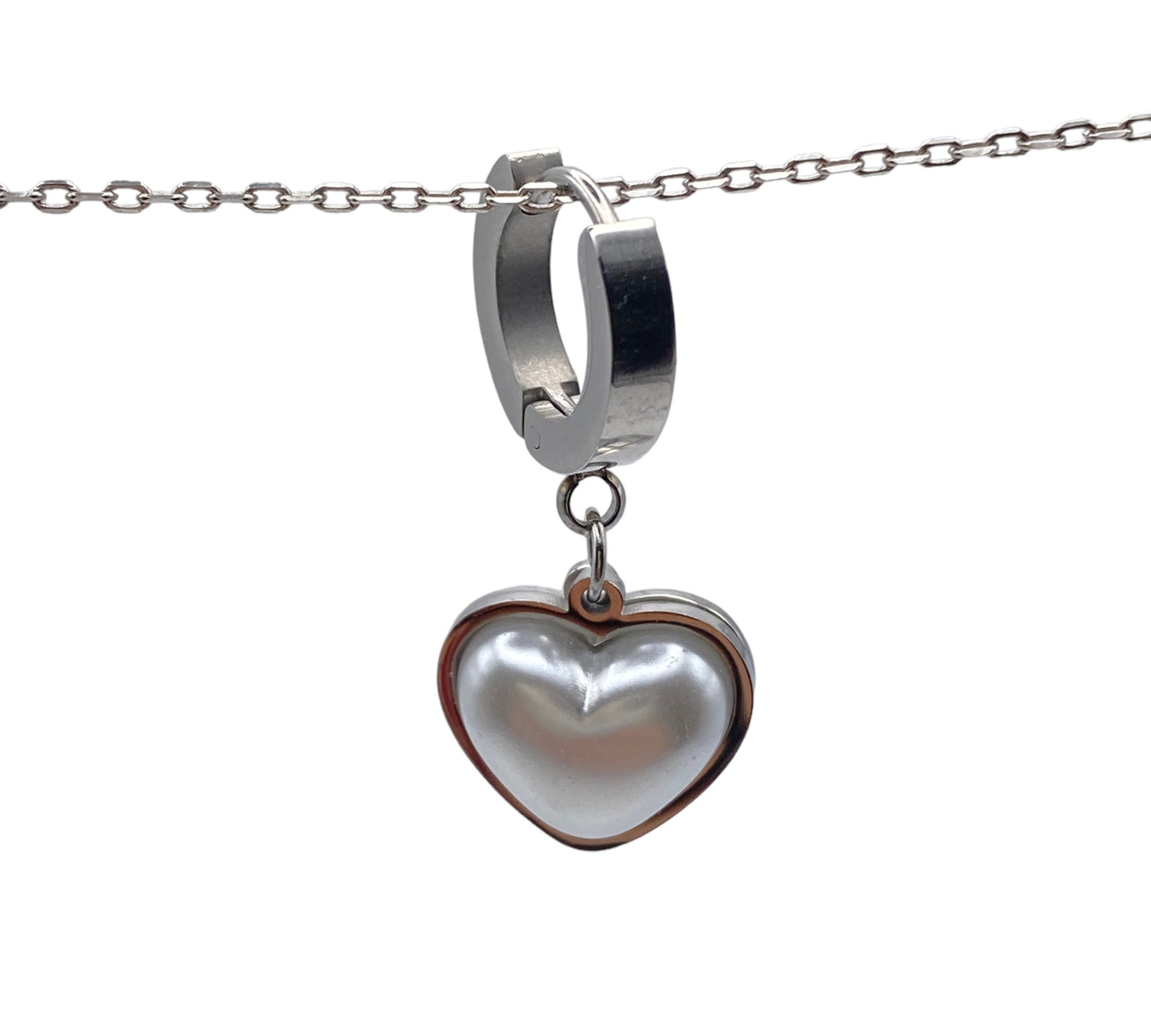 "ISIS" silver colored hoops with a heart shaped pearl pendant