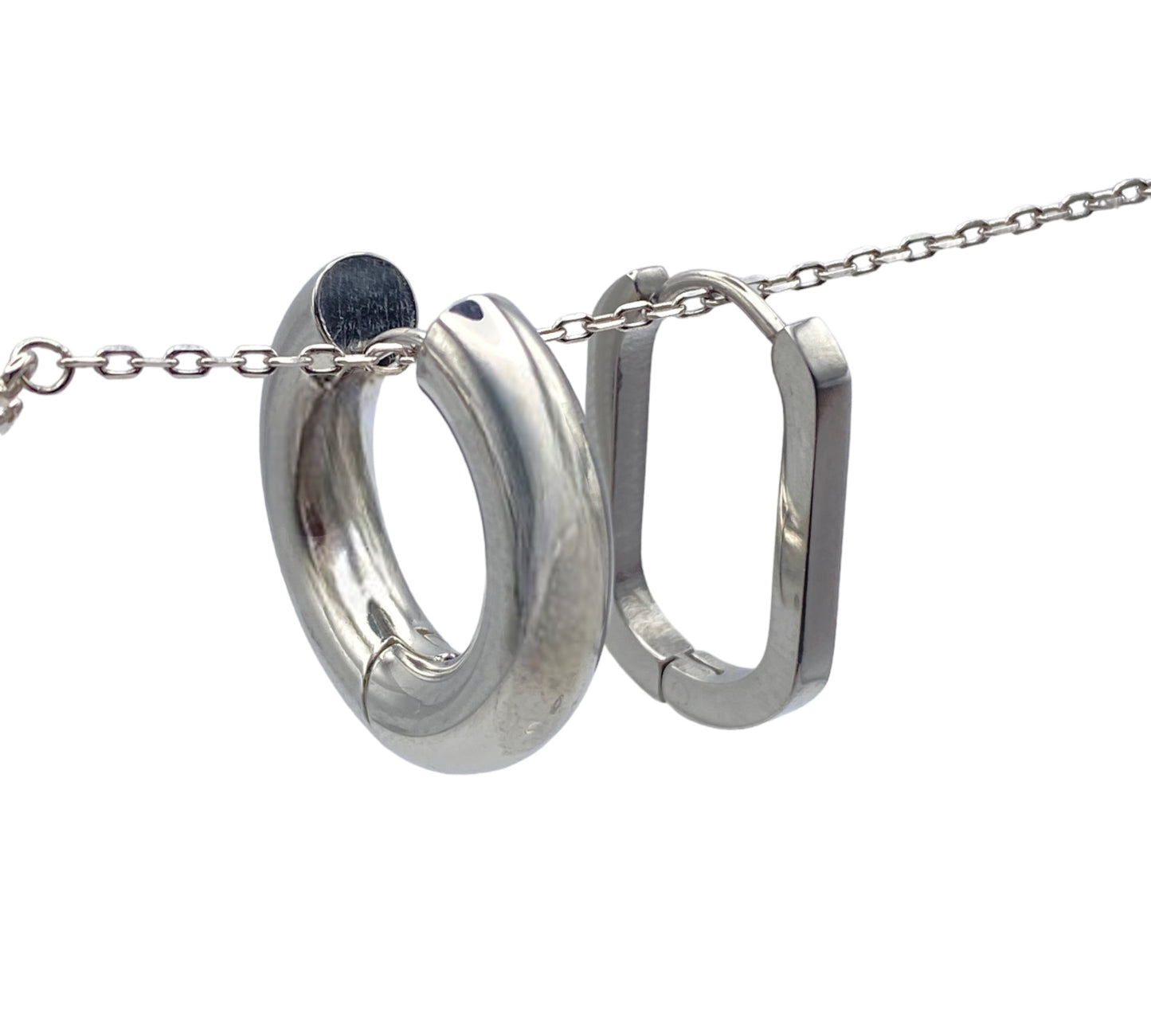 "KALI" silver colored stacking set with a round and oval pair of hoop earrings